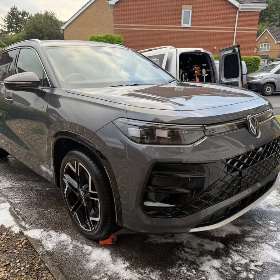 SUV covered in snow foam during an RD Valeting pre-wash